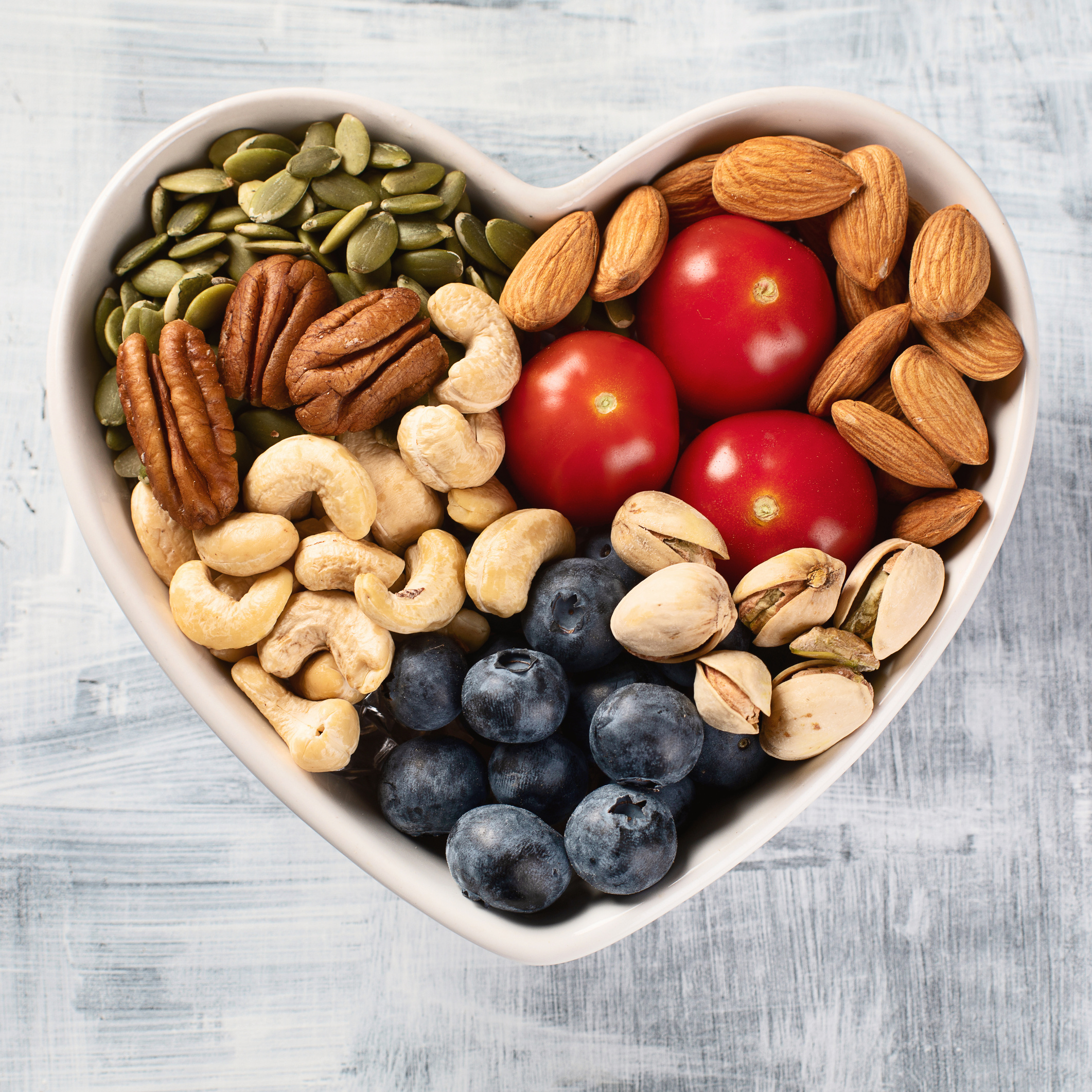 Healthy snack in heart shaped bowl.